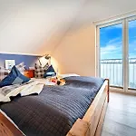 Ferienhaus-boje-by-seeblick-ferien-oro-direkte-wasserlage-sauna Olpenitz